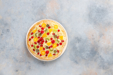 Delicious homemade fruit berry pizza.