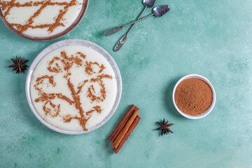 Azerbaijani firni sweet dessert with cinnamon powder.