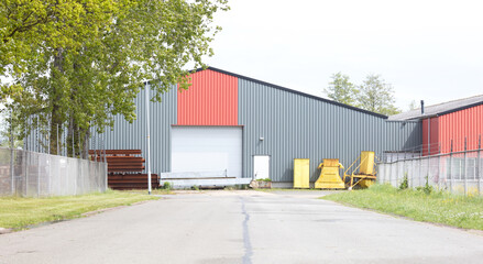 Fototapeta na wymiar Industrial warehouse with roller doors