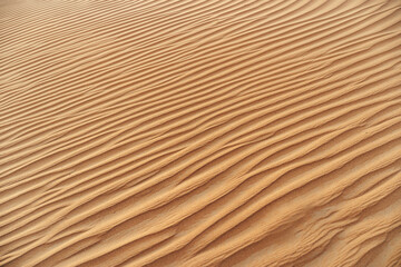 Wavy sand texture in Dubai desert close up