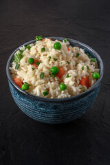 Vegan rice on a dark black background