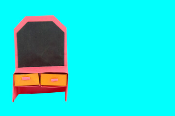 Nice desk made with small craft paper and nicely placed on a paper background