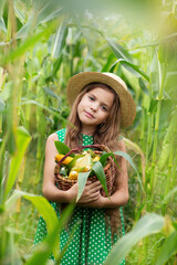 little girl with a basket of vegetables