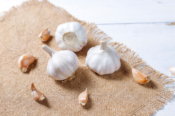 Fototapeta na wymiar Garlic cloves and garlic bulbs.