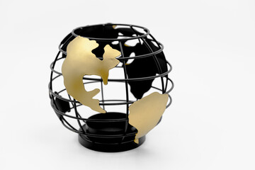 black and gold Earth globe made of wire