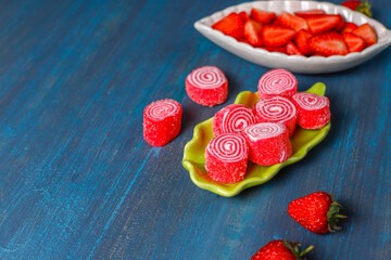 Colorful jelly candies with strawberries.