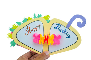 One birthday card made with small craft paper and nicely placed on a paper background