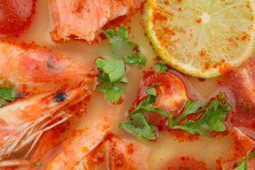 Plate of tasty Tom yum soup, close up