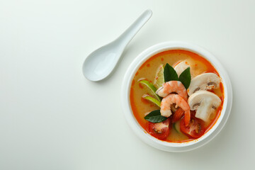 Tasty Tom yum soup on white background