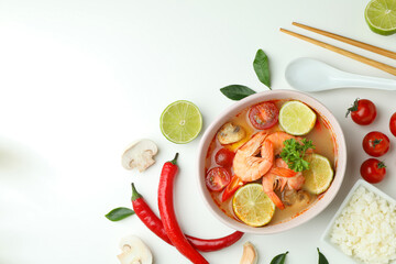 Tom yum soup and ingredients on white background
