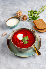 Traditional Ukrainian Russian borscht or red beetroot soup in the bowl.