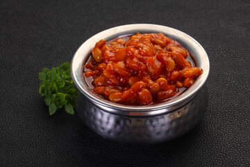 Baked kidney with tomato sauce