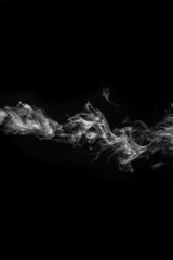 Horizontal curly white steam, fog or smoke isolated with transparent special effect on black background, vertical
