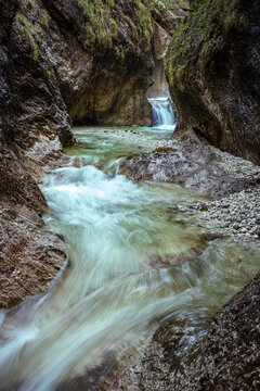 Beautiful narrow gorge with waterfall
