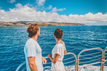 Cruise ship couple on summer Caribbean travel vacation relaxing on boat deck looking at sea. Man...