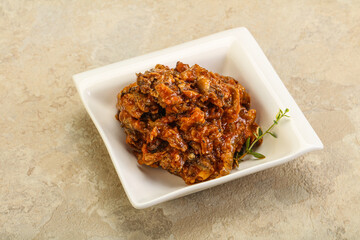 Canned anchovy in tomato sauce