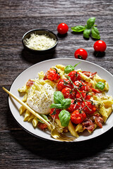 Italian pasta bake with tomatoes and mozzarella