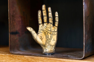 Vintage model of a Tarot or Palmistry hand showing the named lines