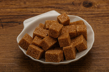 Cane sugar cubs in the bowl