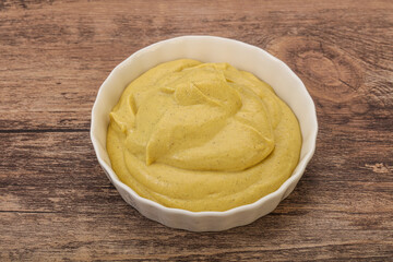 Dijon mustard sauce in the bowl