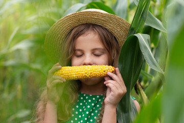 child holding corn