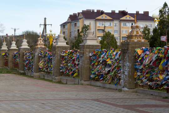 Elista, Russia. Buddhist complex Golden Abode of Buddha Shakyamuni in Kalmykia (Great Hurul). Color Buddhist prayful tags on the fence