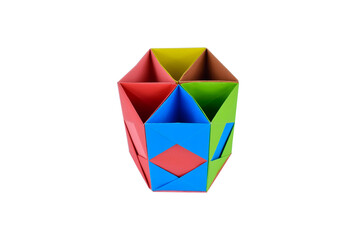 Top view of hand-made paper box placed on top of a white isolated paper background