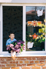 boy with a bouquet of flowers