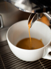espresso coffee, espresso preparation pours coffee