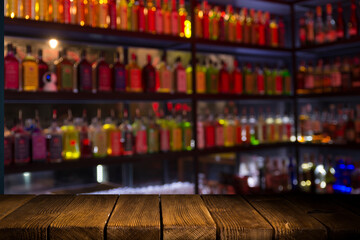 wood table on blur of cafe, coffee shop, bar, background - can used for display or montage your products