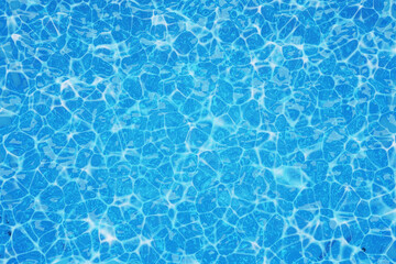 Swimming pool surface with light reflection background or texture