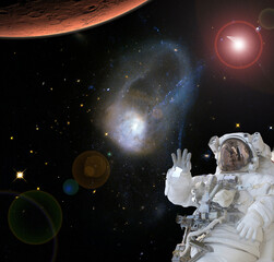 Astronaut and Mars. Deeps space. The elements of this image furnished by NASA.