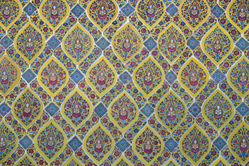 Thai pattern of buddha image surrounded by flowers on colorful wall paper. thailand, pattern,...