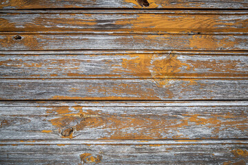 Old weathered board painted yellow