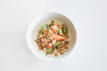 granola yogurt fruit strawberries kiwi nuts healthy