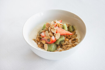 granola yogurt fruit strawberries kiwi nuts healthy