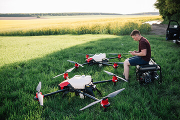 iot smart agriculture industry 4.0 concept, drone (in precision farm) use for spray a water, fertilizer or chemical to the field, farm for growth a yields,crops, use for control, kill the bug or weed