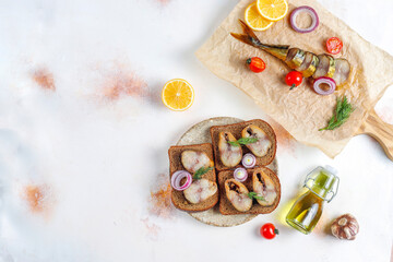 Slices of smoked fish mackerel or scomber.