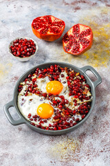 Traditional Azerbaijan cuisine pomegranate seeds with egg narnumru or nar numru.