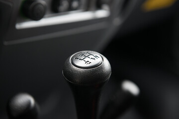 Gearbox lever with speed numbers on the handle.