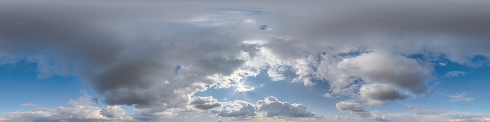 cloudy blue sky hdri panorama 360 degrees angle view with zenith and beautiful clouds for use in 3d graphics as sky dome or edit drone shot