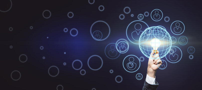 Collective raise money for new idea concept with bright light bulb in businessman hand on abstract dark wallpaper with digital human figures signs. Mock up - Powered by Adobe