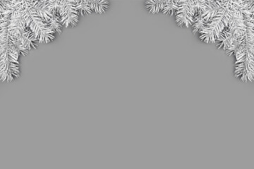 Festive composition with corner borders of fluffy light gray fir branches on gray background. Trendy monochrome xmas template. Top view, flat lay style, copy space for text.
