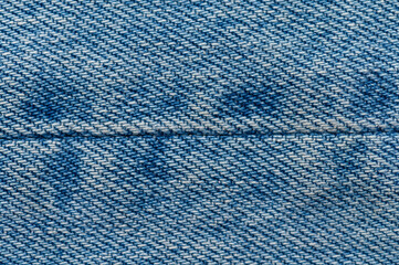 Jeans close up background. Denim stitching