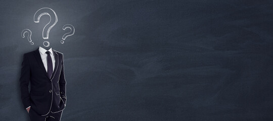 Creative idea and business brainstorming concept with man in black and question mark on his...