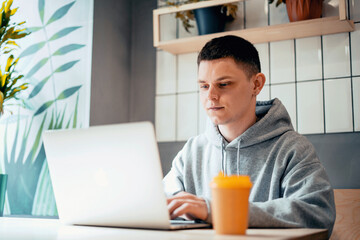 The programmer prints a message on the laptop. Sends an email to the client