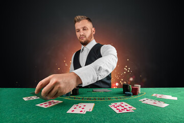 Male dealer at the casino at the table. Casino concept, gambling, poker, chips on the green casino...