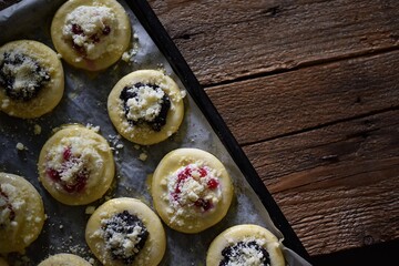 
sourdough cakes ready for baking. Stuffed with cottage cheese filling	

