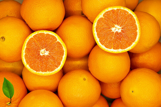 Top view of harvested fresh, ripe, round oranges.