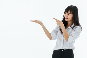 Smart young lady long hair white shirt black pant casual style. Standing smiling point up like showing sign, text, promotion with white background. Portrait good for index finger, advertise.